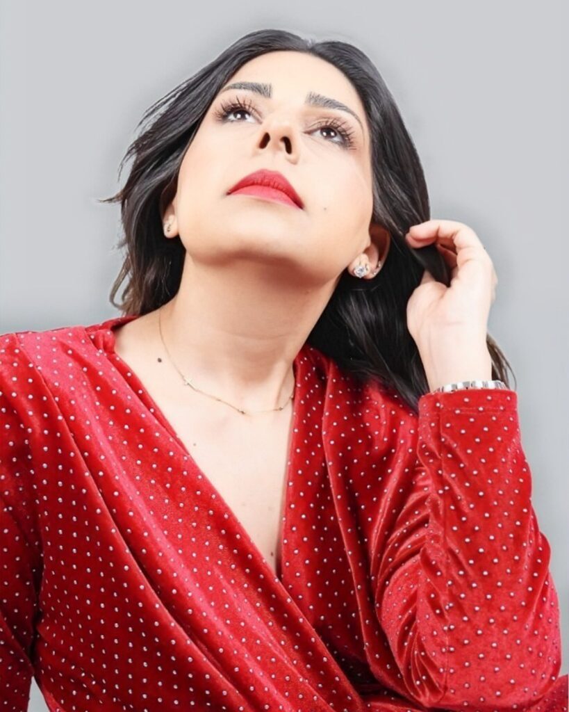 portrait photo of a lady wearing a red dress